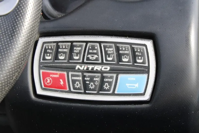 Slide: The Image of Control panel of a 2015 Nitro Z-9 boat with various function buttons. - 29