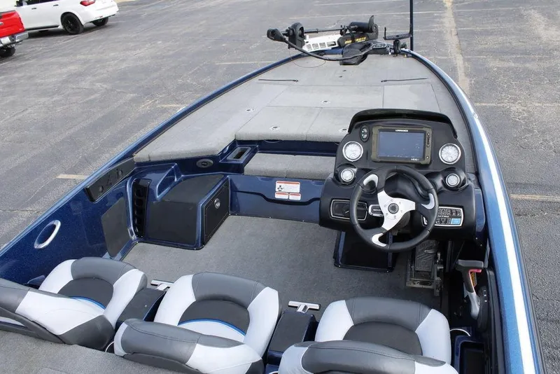 Slide: The Image of 2015 Nitro Z-9 boat interior with steering wheel and dashboard controls. - 30