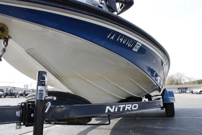 Slide: The Image of 2015 Nitro Z-9 boat on trailer, close-up view of hull and registration. - 7