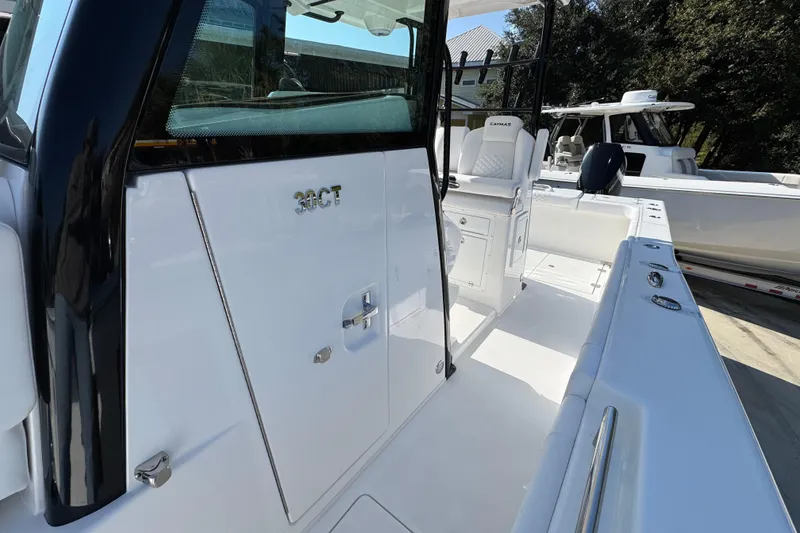 Slide: The Image of 2026 Caymas 30 CT boat interior with sleek white design and modern features. - 21