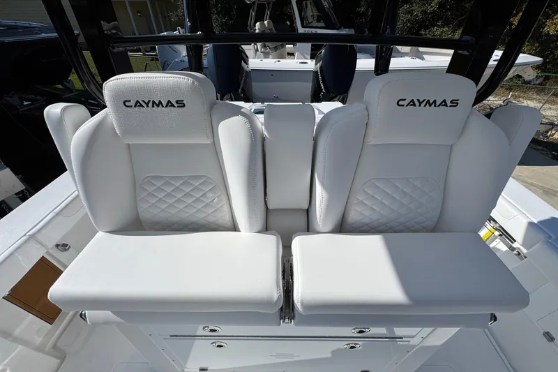 Slide: The Image of 2026 Caymas 30 CT boat with luxurious white seating and diamond stitching. - 27
