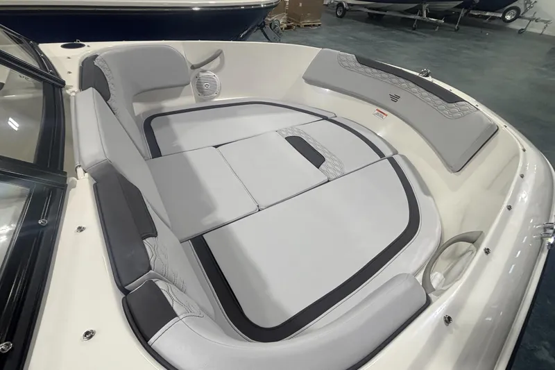 Slide: The Image of 2026 Bayliner M17 boat interior with cushioned seating and modern design. - 5
