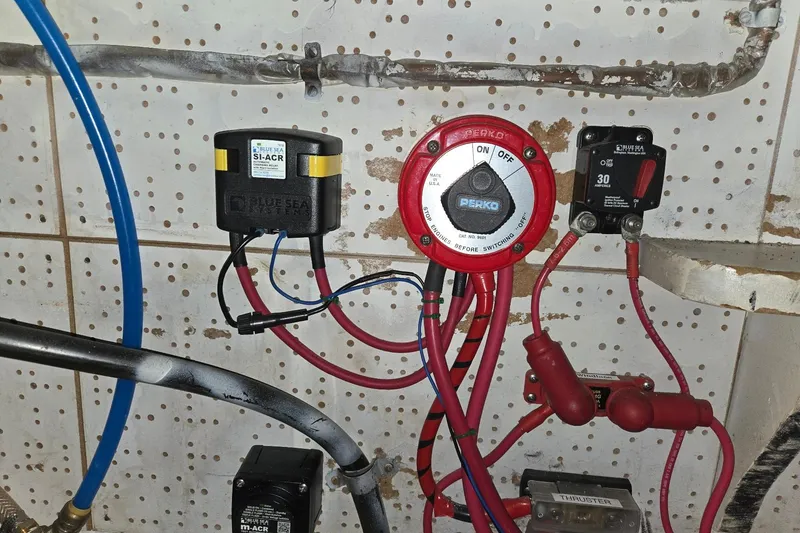 Slide: The Image of Electrical panel with wiring and switches on a 1976 CHB Double Cabin Trawler. - 58