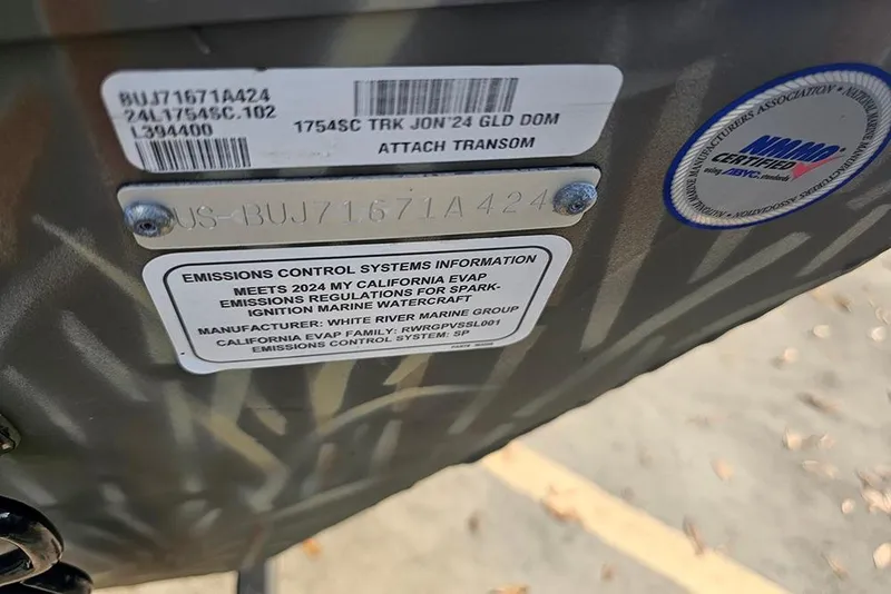 Slide: The Image of 2024 Tracker Grizzly 1754 SC emissions control label and certification details. - 13