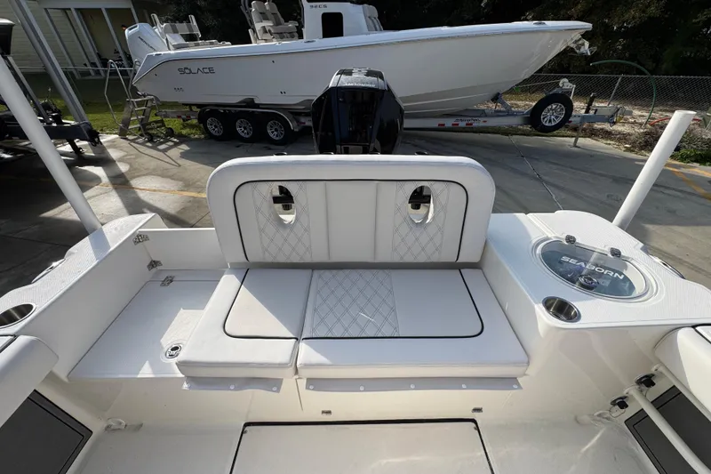 Slide: The Image of 2026 Sea Born LX24 Center Console boat interior with seating and storage features. - 43