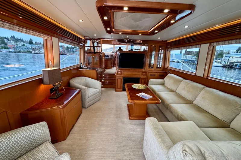 Slide: The Image of Luxurious interior of 2013 Hampton 620 Pilothouse yacht with elegant furnishings and scenic views. - 11