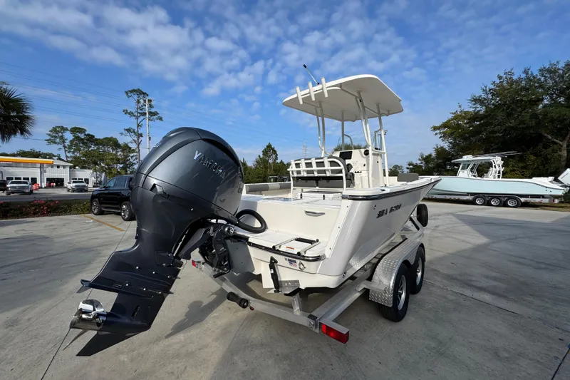 Slide: The Image of 2026 Sea Born LX21 Center Console boat on trailer with Yamaha outboard motor. - 11