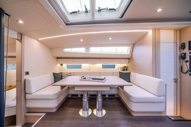Slide: The Image of Luxurious interior of 2024 Jeanneau 65 yacht with elegant seating and modern design. - 10