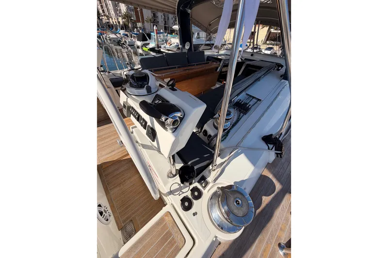 Slide: The Image of Cockpit view of 2015 Beneteau Oceanis Yacht 60, showcasing helm and seating area. - 30