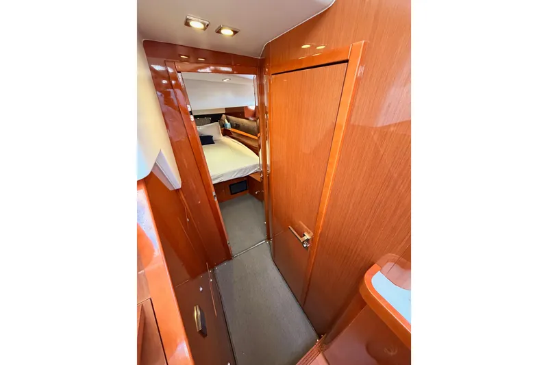 Slide: The Image of Luxurious interior of 2015 Beneteau Oceanis Yacht 60 with polished wood finish. - 48