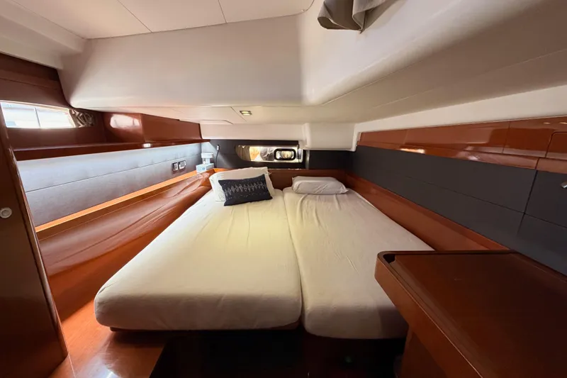 Slide: The Image of Luxurious cabin interior of 2015 Beneteau Oceanis Yacht 60 with double bed. - 63