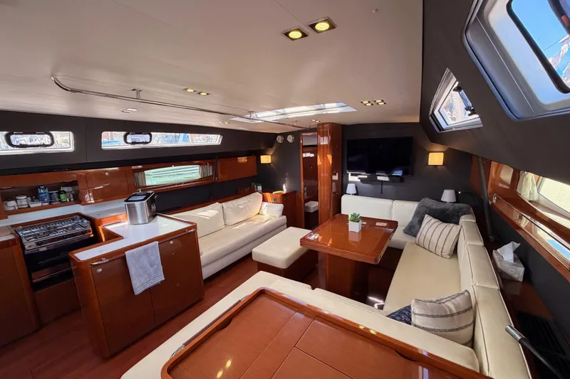 Slide: The Image of Luxurious interior of 2015 Beneteau Oceanis Yacht 60 with elegant seating and modern amenities. - 73