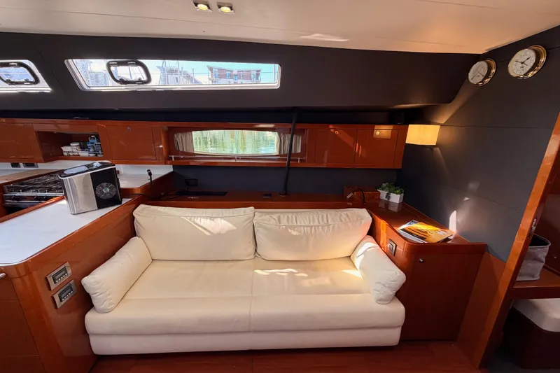 Slide: The Image of Luxurious interior of 2015 Beneteau Oceanis Yacht 60 with elegant seating and modern amenities. - 77