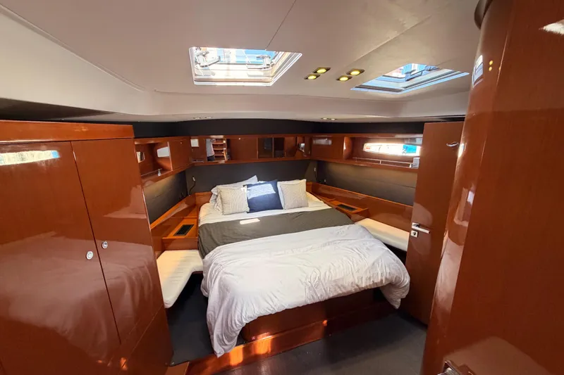 Slide: The Image of Luxurious cabin interior of 2015 Beneteau Oceanis Yacht 60 with elegant wood finish. - 81