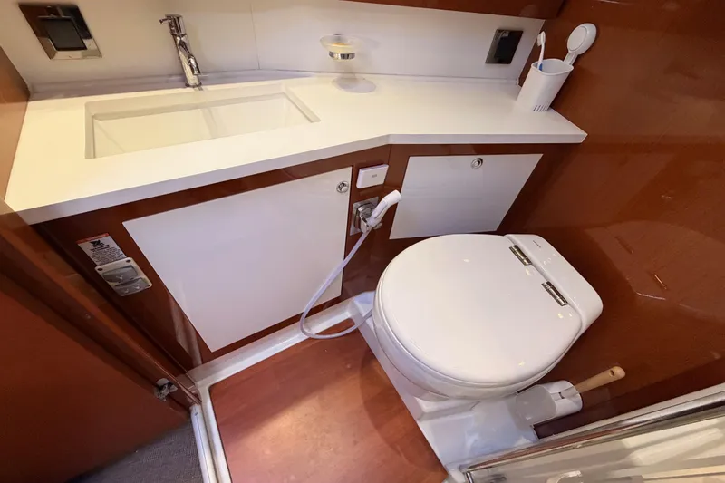 Slide: The Image of Luxurious bathroom in 2015 Beneteau Oceanis Yacht 60 with modern fixtures and elegant design. - 87