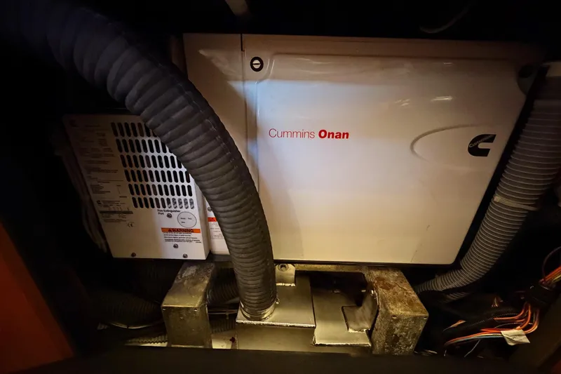 Slide: The Image of Engine room of 2015 Beneteau Oceanis Yacht 60 with Cummins Onan generator. - 96