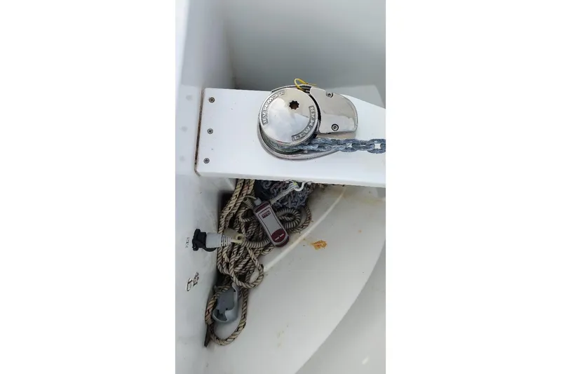Slide: The Image of Anchor chain and winch on 2017 Jeanneau Merry Fisher 795 boat. - 14
