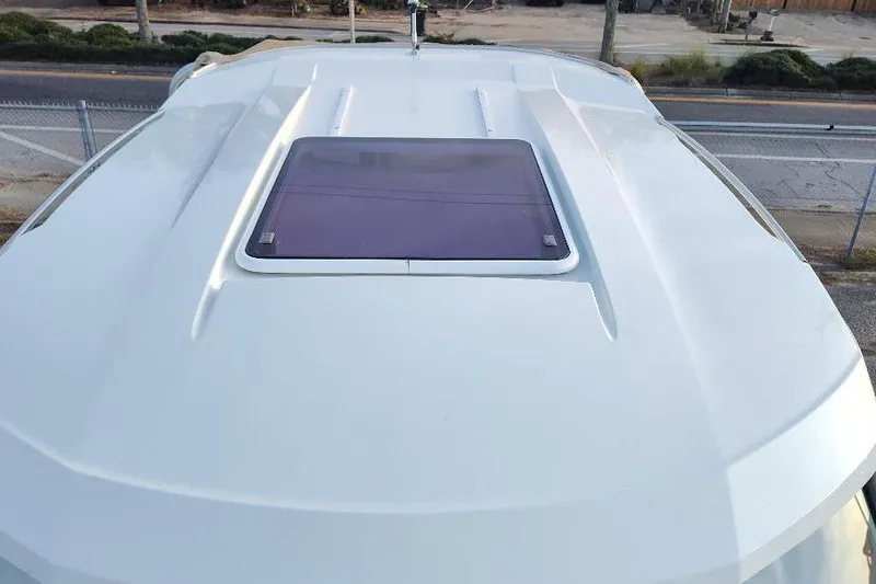 Slide: The Image of Rooftop view of 2017 Jeanneau Merry Fisher 795 boat with hatch. - 16