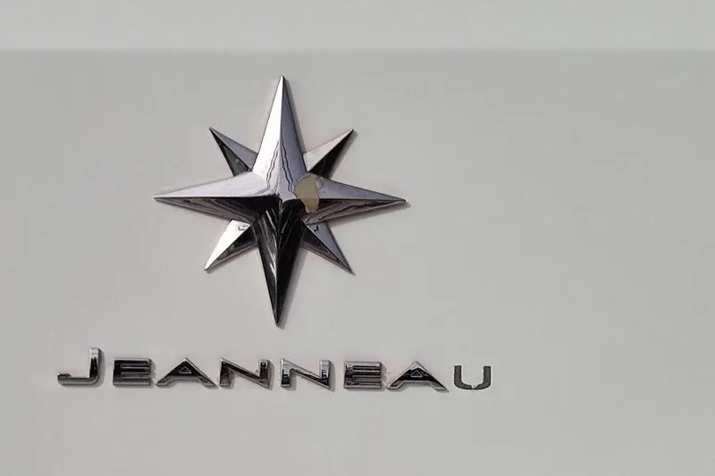 Slide: The Image of Jeanneau Merry Fisher 795 2017 logo with star emblem on white background. - 30