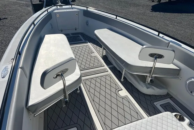 Slide: The Image of 2006 Dakota 36 Open boat interior with cushioned seating and patterned flooring. - 11