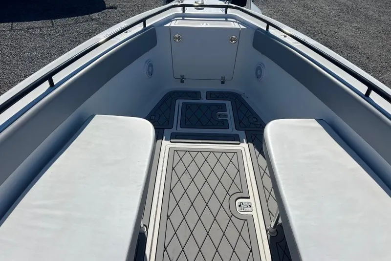 Slide: The Image of 2006 Dakota 36 Open boat interior with cushioned seating and non-slip flooring. - 12