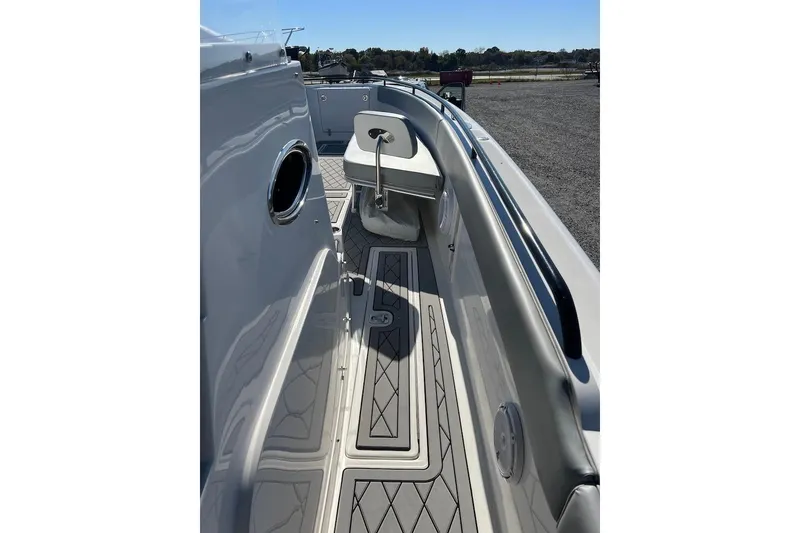 Slide: The Image of 2006 Dakota 36 Open boat deck with seating and sleek design. - 19