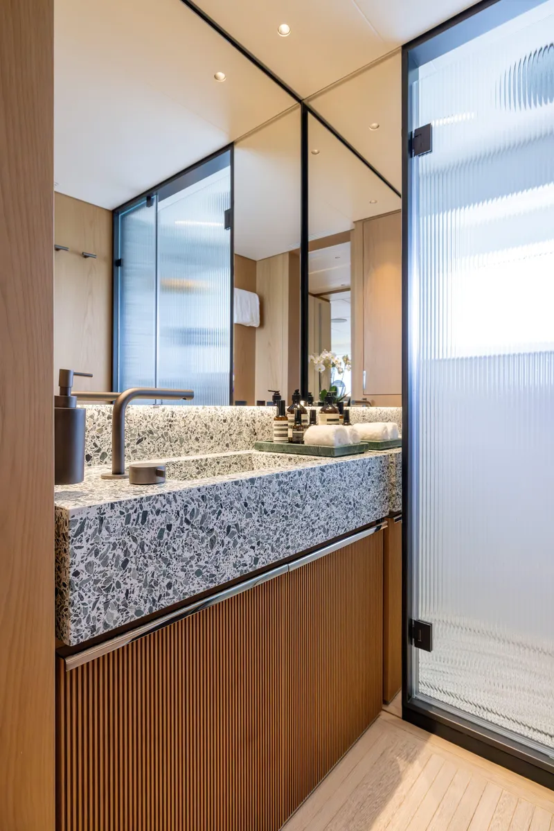 Slide: The Image of Luxurious bathroom in 2024 Benetti Oasis 34M yacht, featuring modern design and elegant fixtures. - 44