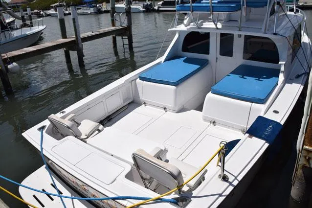 Slide: The Image of dockside with cushions out on engine boxes - 5