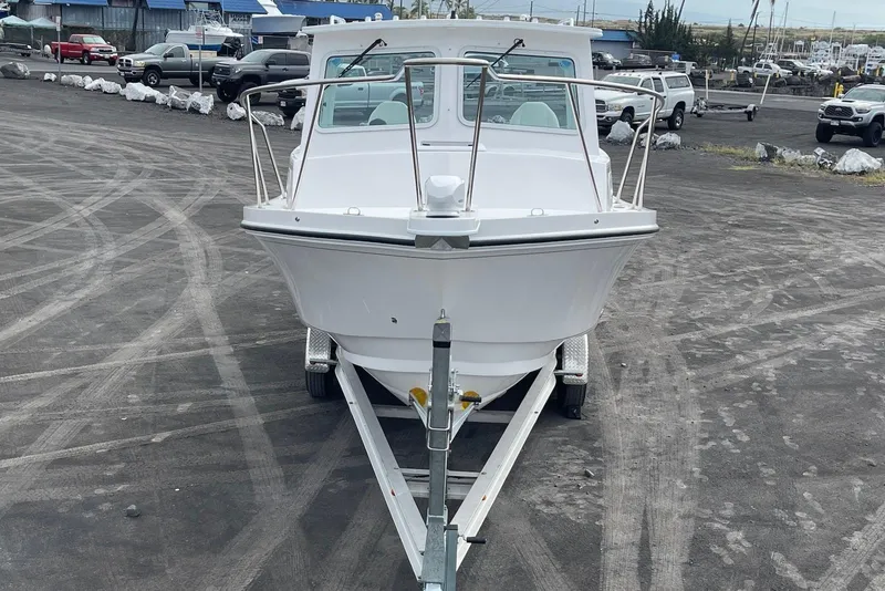 Slide: The Image of 2026 Steiger Craft 28 Hawaii boat on trailer in parking lot. - 4