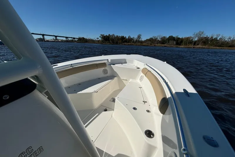 Slide: The Image of 2019 Key West 244 Center Console boat on calm water, clear sky background. - 18