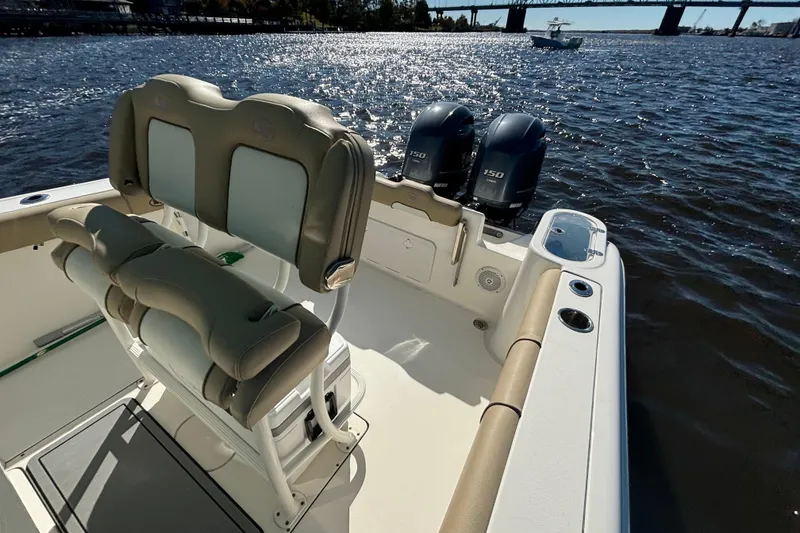 Slide: The Image of 2019 Key West 244 Center Console boat with dual engines on a sunny day. - 25