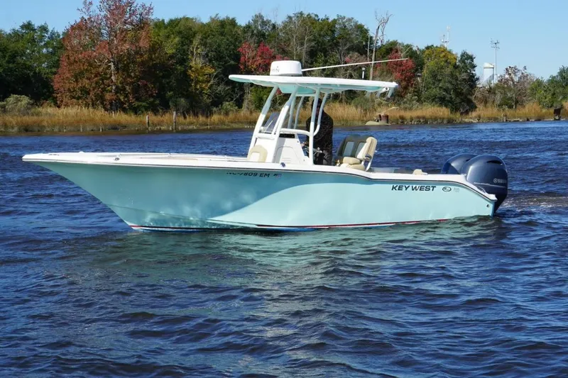 Slide: The Image of 2019 Key West 244 Center Console boat on a scenic waterway. - 5