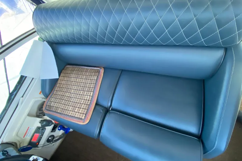 Slide: The Image of Luxurious blue leather seating in 2007 Cruisers Yachts 370 Express. - 27