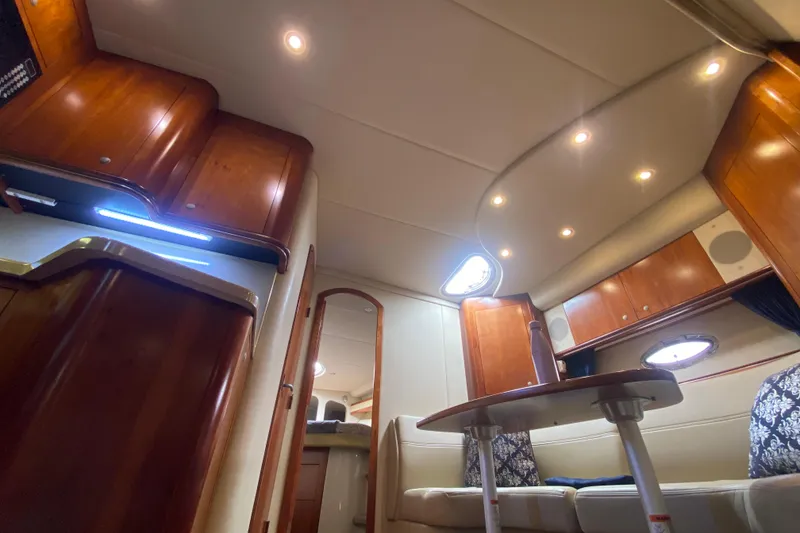 Slide: The Image of Luxurious interior of 2007 Cruisers Yachts 370 Express with elegant wood finishes. - 43