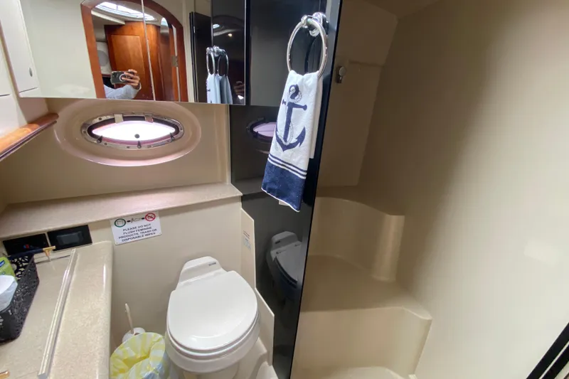 Slide: The Image of Bathroom interior of 2007 Cruisers Yachts 370 Express with nautical decor. - 49