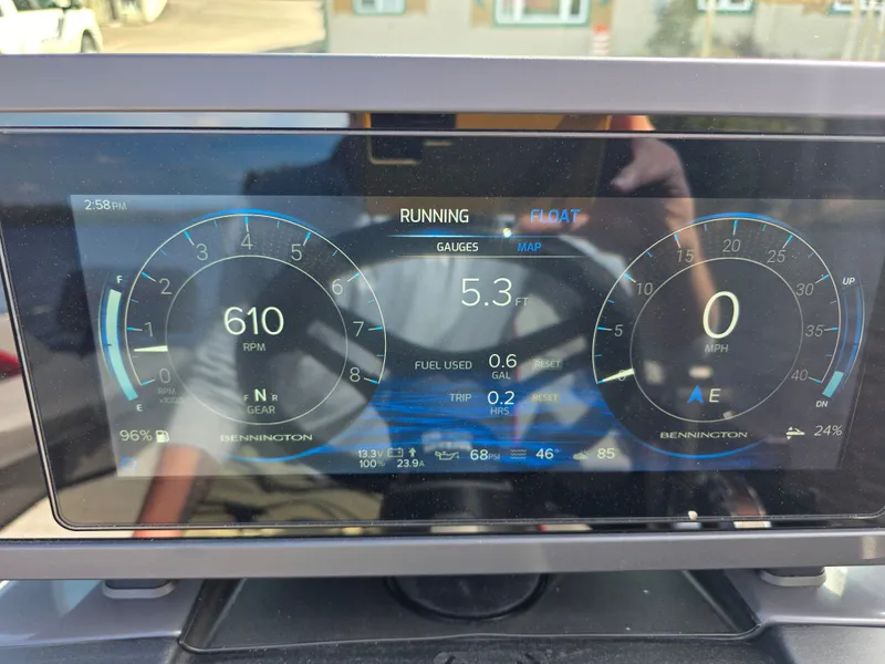 Slide: The Image of Bennington 24MSL-ESP TRI 2026 dashboard with tachometer and fuel gauge. - 11