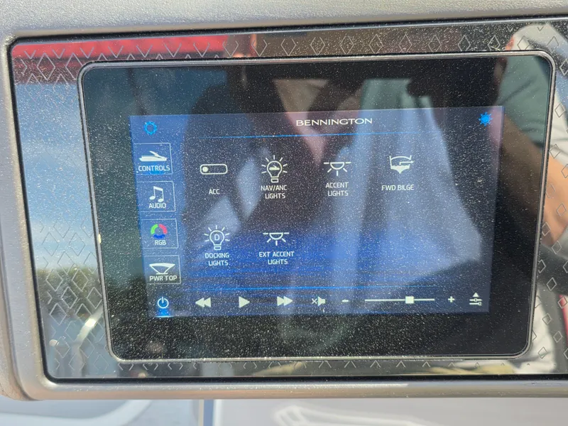 Slide: The Image of Bennington 24MSL-ESP TRI 2026 control panel with lighting and audio options. - 13