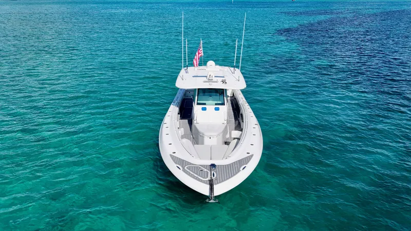 Slide: The Image of 2019 HCB 42 Siesta boat on clear turquoise water, aerial view. - 15