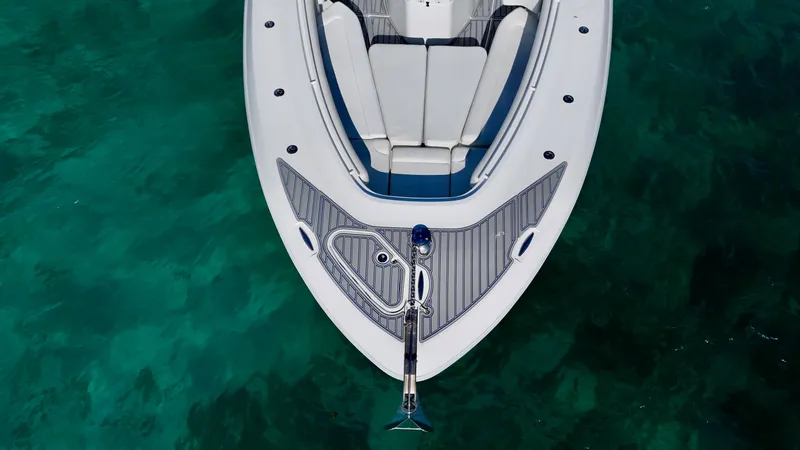 Slide: The Image of Top view of 2019 HCB 42 Siesta boat on clear turquoise water. - 18