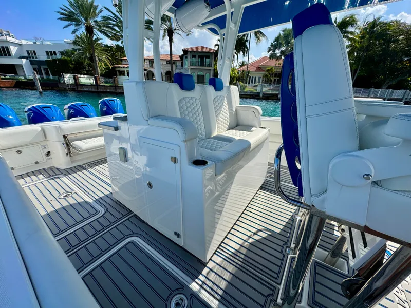 Slide: The Image of 2019 HCB 42 Siesta boat interior with luxurious seating and sleek design. - 64