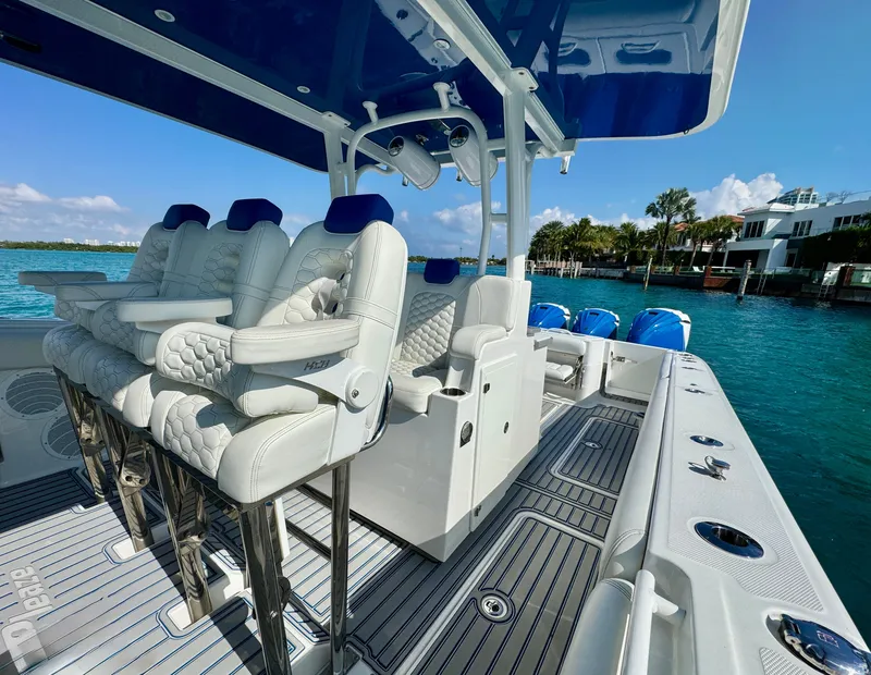Slide: The Image of 2019 HCB 42 Siesta boat interior with luxurious seating and ocean view. - 65