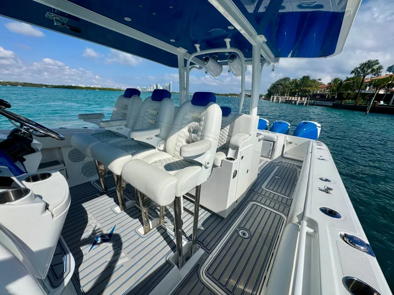 Slide: The Image of 2019 HCB 42 Siesta boat interior with luxurious seating and ocean view. - 69