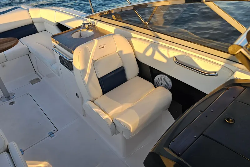 Slide: The Image of 2008 Regal 2700 ES Bowrider interior with white seating and sleek design. - 22