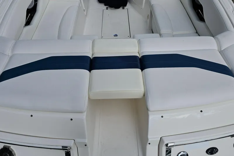 Slide: The Image of 2008 Regal 2700 ES Bowrider interior seating with white and blue upholstery. - 72