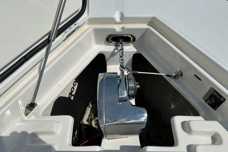 Slide: The Image of Anchor winch system on a 2010 Jupiter 34 FS boat deck. - 26