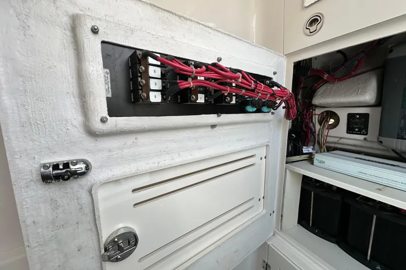 Slide: The Image of Electrical panel with wiring inside a 2010 Jupiter 34 FS boat. - 41