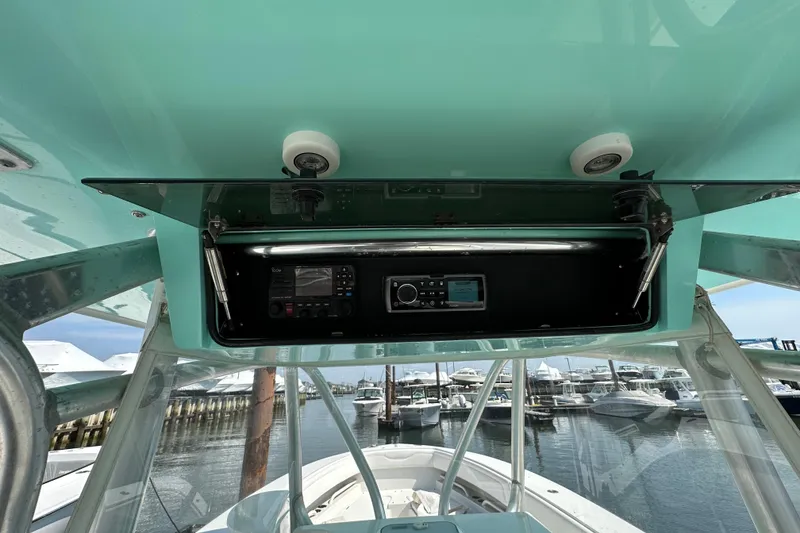 Slide: The Image of 2010 Jupiter 34 FS boat console with electronics, docked at marina. - 47