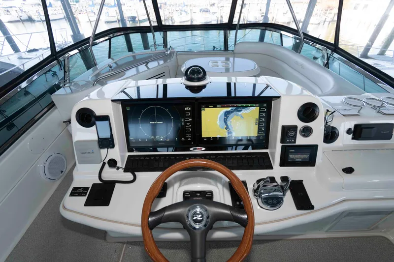 Slide: The Image of Helm of 2008 Sea Ray 52 Sedan Bridge with advanced navigation systems. - 13
