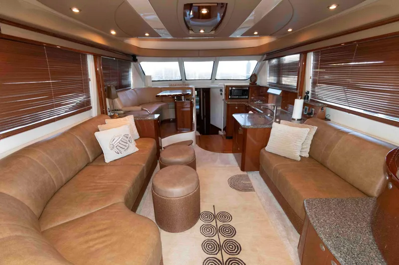 Slide: The Image of Luxurious interior of 2008 Sea Ray 52 Sedan Bridge yacht with plush seating and modern amenities. - 21