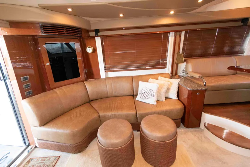 Slide: The Image of Luxurious interior of 2008 Sea Ray 52 Sedan Bridge yacht with plush seating and elegant decor. - 22